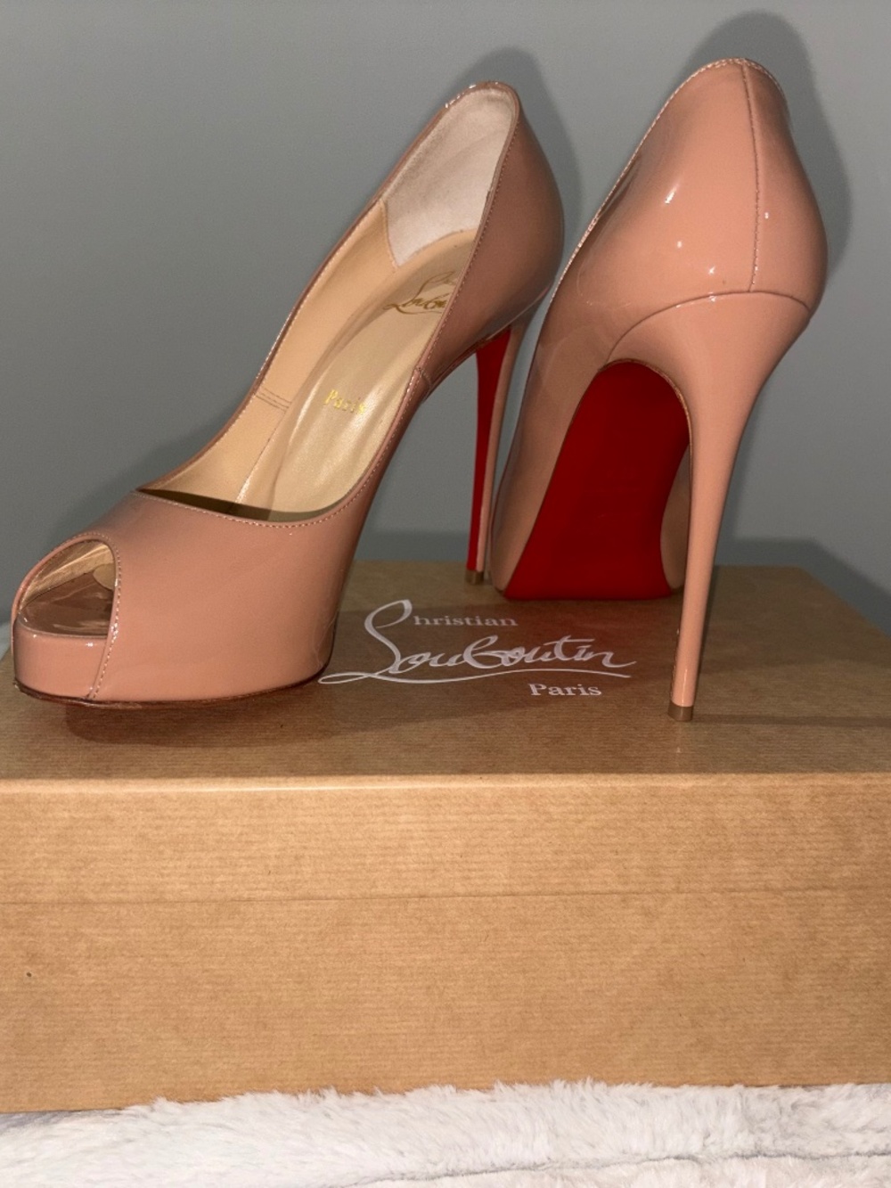 Christian Louboutin iconic nude peep toe